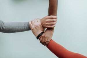 hands together on white background